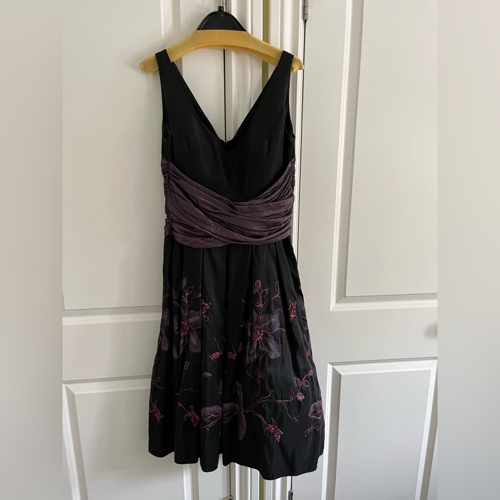 Simon Change ruched waist embroidered tea length dress.